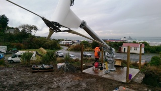 Bluff Marae with a worker helping with energy efficiency